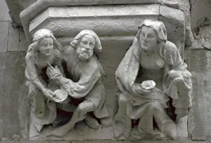 Stone carving on the side of a house in Bruges