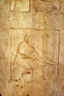 Tongs Prints: Stone relic of Hephaistos, Roman Smith-God, Turkey, 20th century