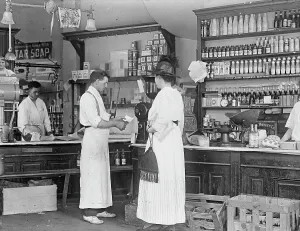 Stamping Prints: Store Interior, 1917 or 1918. Creator: Harris & Ewing