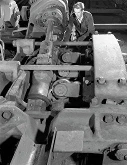 Steelworker Prints: Straightening round bars, J Beardshaw & Sons, Sheffield, South Yorkshire, 1963