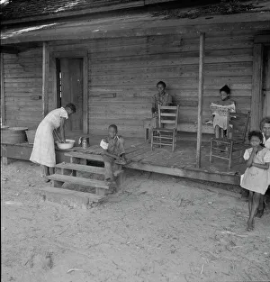 Literacy Prints: Stranded residents of Careyville, Florida, , 1937. Creator: Dorothea Lange