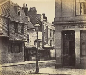 Cobblestone Gallery: Street with Lamp Post and Wine Shop, 1850s. Creator: Unknown