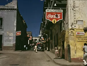 Sidewalk Gallery: Street in San Juan, Puerto Rico, 1941. Creator: Jack Delano
