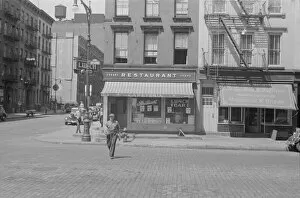 Blind Gallery: A street scene, 61st Street between 1st and 3rd Avenues, New York, 1938. Creator: Walker Evans