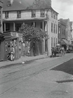 Street scene, [75 King Street], Charleston, South Carolina, between 1920 and 1926. Creator: Arnold Genthe