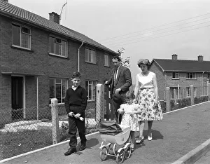 Nottinghamshire Prints: Street scene with family, Ollerton, North Nottinghamshire, 11th July 1962. Artist