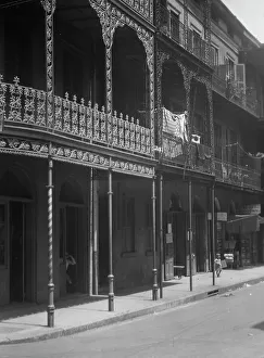Balcony Rail Prints: Street scene in the French Quarter
