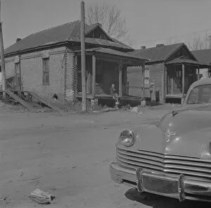 Porch Gallery: Street scene, Jacksonville, Florida, 1943. Creator: Gordon Parks