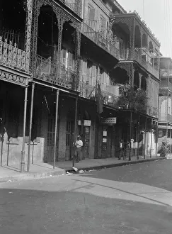 Grocers Prints: Street scene, New Orleans, between 1920 and 1926. Creator: Arnold Genthe