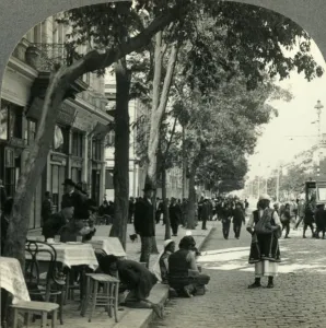 Pavement Cafe Prints: Street Scene Showing Peasant Woman and Sidewalk Coffee-House, Sofia, Bulgaria, c1930s