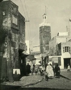 Fisher Unwin Prints: Street Scene in Tangier, Showing Mosque, 1902. Creator: Unknown