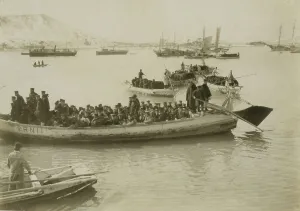 Rudder Prints: String of pontoons in tow of stream launch