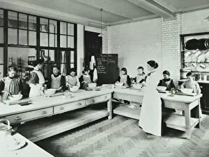 Domestic Help Gallery: Student teacher in a cookery lesson, Battersea Polytechnic, London, 1907