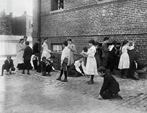 Students of 8th Division school using rulers, yardsticks, and measuring... Washington, DC, (1899?). Creator: Frances Benjamin Johnston