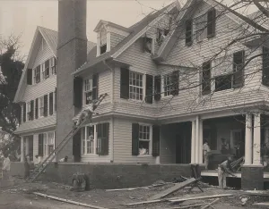 Practical Prints: Students at work on a house built largely by them