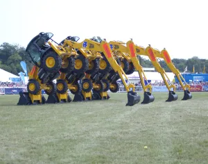 Hampshire Prints: Stunt JCB diggers perfoming formation dance routine at New Forest show 2006