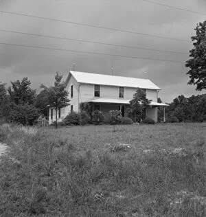 Porch Gallery: Substantial looking tobacco farm, Person county, North Carolina, 1939. Creator: Dorothea Lange