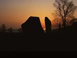 Sunrise on Megalithic Circle, Avebury, Wiltshire, 20th century. Artist: CM Dixon