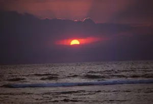 Sunset over Indian Ocean in Hikkaduwa, Sri Lanka, 20th century. Artist: CM Dixon