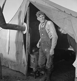 Tent City Collection: Supper time in FSA migratory emergency camp...the pea fields, Calipatria, CA, 1939