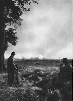 Shelling Prints: Sur la Ligne de Feu; Le premier shrapnell de la journee, 1914. Creator: Unknown