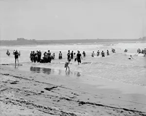 Paddling Prints: Surf bathing at Easton's Beach, Newport, R.I. between 1900 and 1905. Creator: Unknown