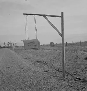 Adjusting Gallery: Swinging mail boxes in country where snow is deep in winter, Boundary County, Idaho, 1939
