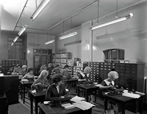 Computer Prints: Tabulating machines in the punch room in a Sheffield Factory office, 1963. Artist