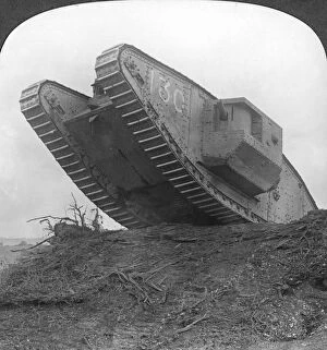 Cambrai Collection: A tank breaking through the wire at Cambrai, France, World War I, c1917-c1918