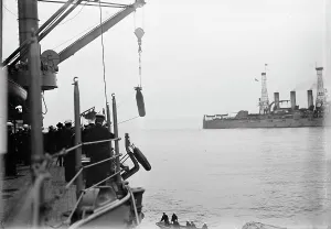 Target Practice - Hauling Torpedoes On Board, 1913. Creator: Unknown