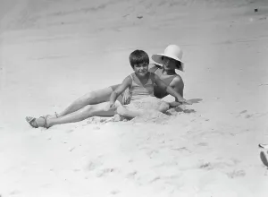 Group Portraits Prints: Taylor, Fenton, Mrs. and child, at the beach, 1931 Creator: Arnold Genthe