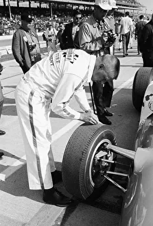 Pits Prints: Technician checking tyre wear, Indianapolis, Indiana, USA, 1965