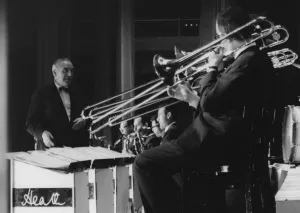 Trombonist Prints: Ted Heath and His Music, Nat King Cole concert, London, 1963 Creator: Brian Foskett