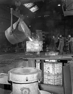 Barnsley Prints: Teeming iron at Wombwell foundry, South Yorkshire, 1963. Artist: Michael Walters