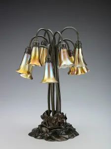1902 Prints: Ten-light pond lily lamp, after 1902. Creator: Tiffany Glass