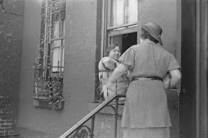 A tenant, 61st Street between 1st and 3rd Avenues, New York, 1938. Creator: Walker Evans