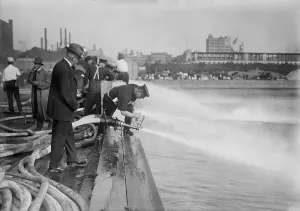 Pump Prints: Testing stream from motor fire engines, 1913. Creator: Bain News Service
