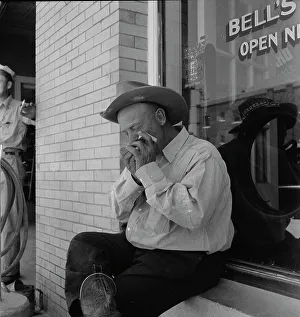 Cowboy Hat Prints: A Texas cattleman is distinguished... Van Horn, Texas, 1937. Creator: Dorothea Lange