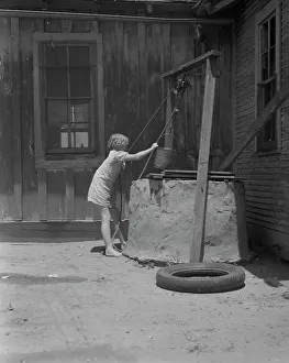 One of a Texas sharecropper's ten children, Hall County, Texas, 1937. Creator: Dorothea Lange