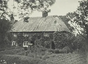 Photograph Album Prints: Thatched cottage. From the album: Photograph album - England, 1920s. Creator: Harry Moult