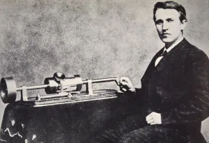 Phonograph Prints: Thomas Alva Edison sitting beside his invention, the phonograph, 1878