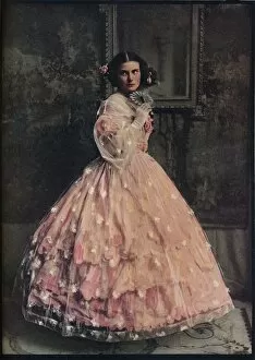 A three-flounced ball-dress of pink silk, with overdress of white flowered gauze, 1850-60, c1913