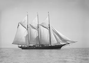 The three-mast auxiliary schooner Invincible, 1911. Creator: Kirk & Sons of Cowes