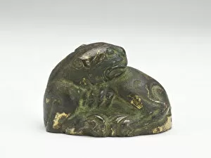 Bronze With Gilding Collection: Tiger-shaped ornament or weight, Period of Division, 220-589. Creator: Unknown