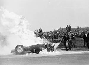 Brooks Prints: Tony Brooks car on fire at the British Grand Prix, Silverstone, Northamptonshire, 1956