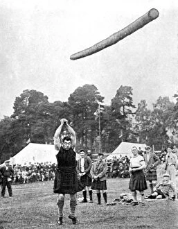 Strong Gallery: Tossing the caber at the Highland games, Scotland, 1936. Artist: Fox