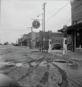 Filling Station Prints: The town of Caddo, Oklahoma, 1938. Creator: Dorothea Lange