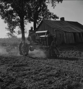 Mississippi United States Of America Prints: Tractor and driver on the Aldridge Plantation, Mississippi, 1937. Creator: Dorothea Lange