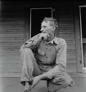 Texan Prints: Tractor driver on cotton farm near Memphis, Texas, 1937. Creator: Dorothea Lange