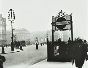 London County Council Collection: Trafalgar Square with Underground entrance and Admiralty Arch behind, London, 1913